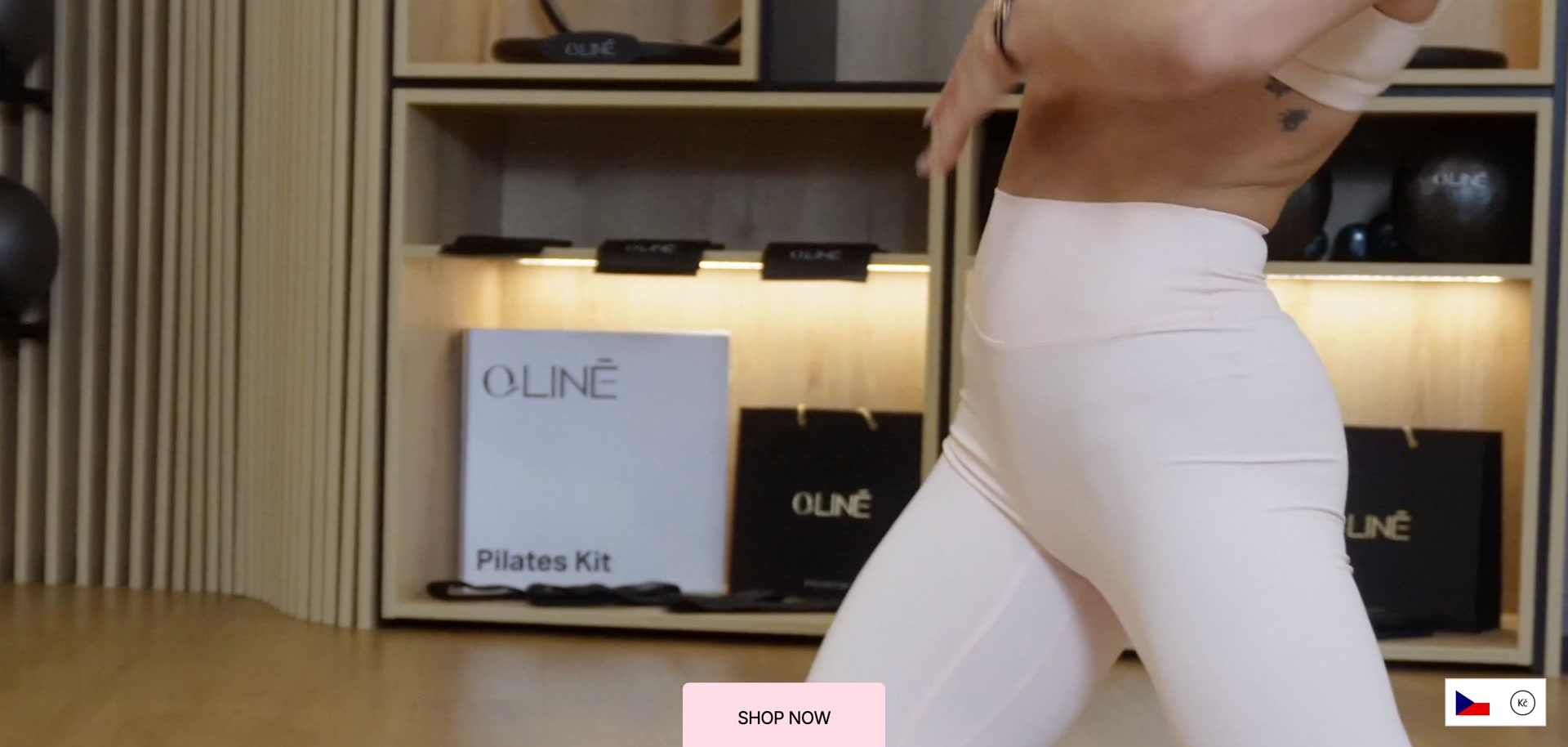The QLINE storefront hero: a pilates studio with branded shelving